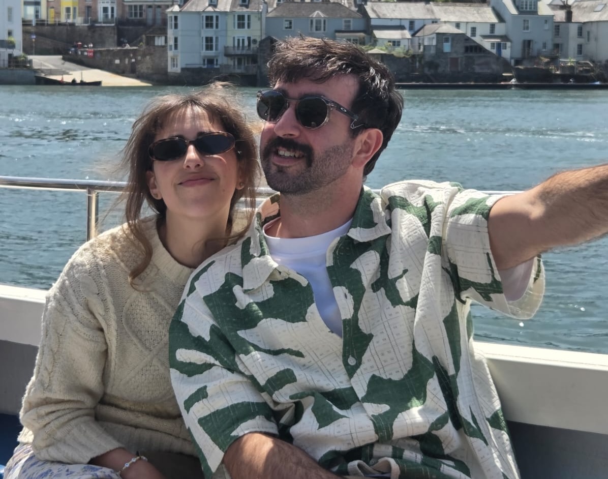 Eliot and a companion on a boat in Cornwall